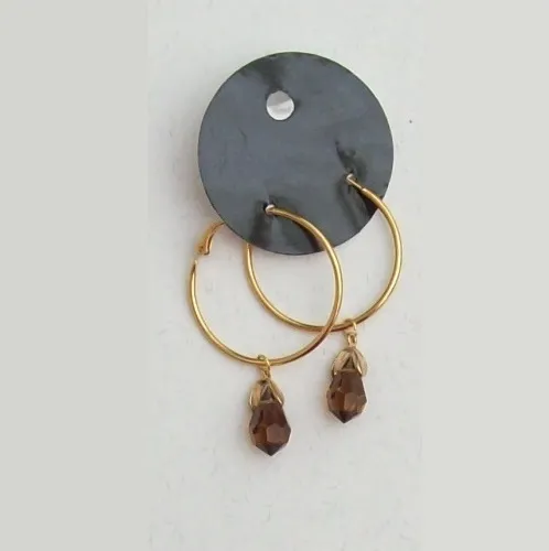 brinco cristal preciosa gota 9x15mm smok top�zio argola 35mm dourada fecho trava. 1 par