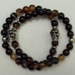 Pulseira masculina pedra vulc�nica olho de tigre tons de marrom e enfeite caveira inox. 1 Pe�a