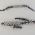 Pulseira inox masculina 22X0,8cm com detalhes prateados e negros com fecho trava. 1 pulseira